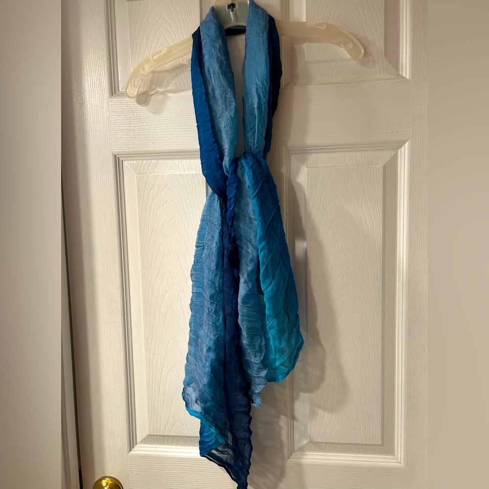 Blue and teal ombré silk crinkle scarf. Worn a few times. Excellent shape.